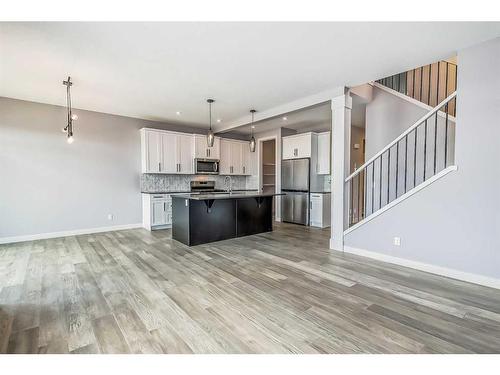 148 Sundown Crescent, Cochrane, AB - Indoor Photo Showing Kitchen