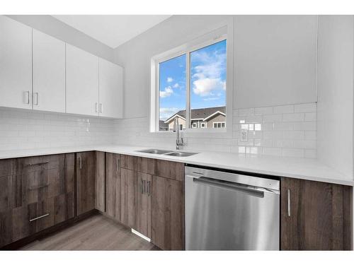 415-137 Red Embers Link Ne, Calgary, AB - Indoor Photo Showing Kitchen With Double Sink With Upgraded Kitchen