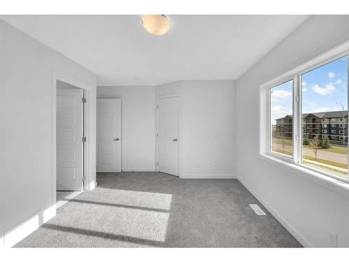 415-137 Red Embers Link Ne, Calgary, AB - Indoor Photo Showing Other Room