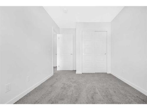 415-137 Red Embers Link Ne, Calgary, AB - Indoor Photo Showing Other Room