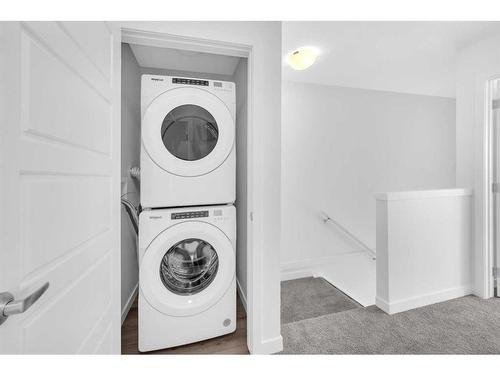 415-137 Red Embers Link Ne, Calgary, AB - Indoor Photo Showing Laundry Room