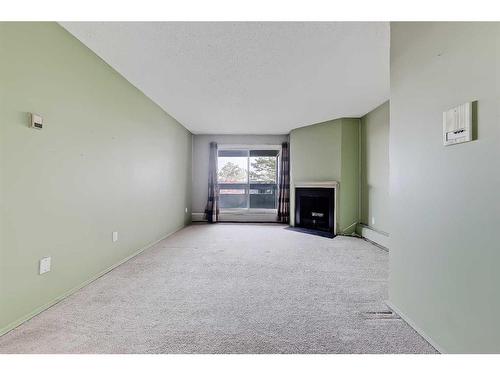 5312-315 Southampton Drive Sw, Calgary, AB - Indoor With Fireplace