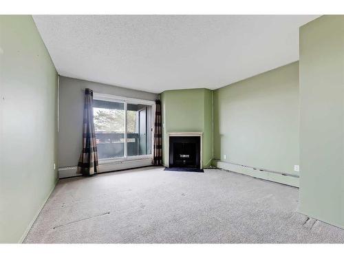 5312-315 Southampton Drive Sw, Calgary, AB - Indoor With Fireplace