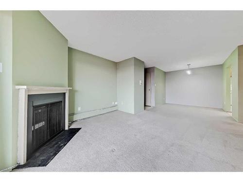 5312-315 Southampton Drive Sw, Calgary, AB - Indoor With Fireplace