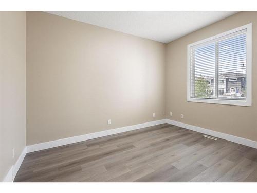 109 Kinniburgh Boulevard, Chestermere, AB - Indoor Photo Showing Other Room