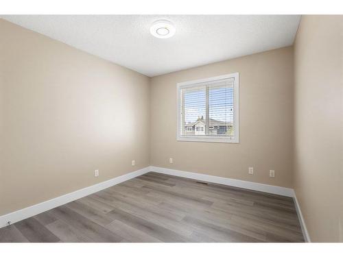 109 Kinniburgh Boulevard, Chestermere, AB - Indoor Photo Showing Other Room