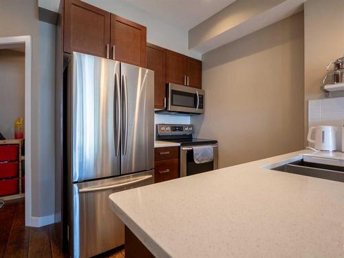 314-22 Auburn Bay Link Se, Calgary, AB - Indoor Photo Showing Kitchen With Stainless Steel Kitchen