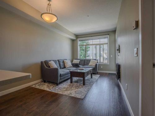 314-22 Auburn Bay Link Se, Calgary, AB - Indoor Photo Showing Living Room