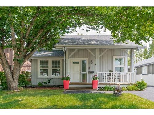 79 Woodfield Crescent Sw, Calgary, AB - Outdoor With Deck Patio Veranda With Facade