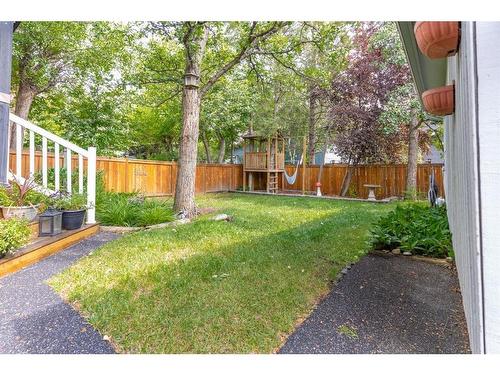 79 Woodfield Crescent Sw, Calgary, AB - Outdoor With Backyard