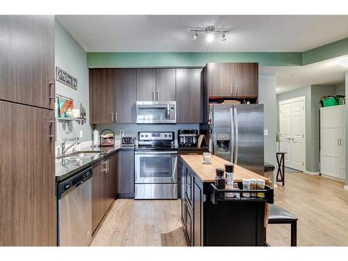 2210-215 Legacy Boulevard Se, Calgary, AB - Indoor Photo Showing Kitchen With Double Sink