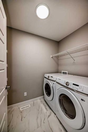 297 Homestead Crescent Ne, Calgary, AB - Indoor Photo Showing Laundry Room