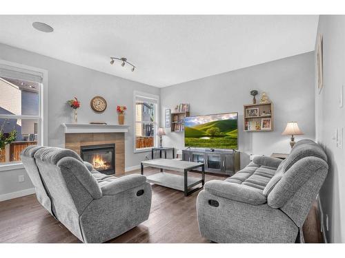 178 Chaparral Valley Way Se, Calgary, AB - Indoor Photo Showing Living Room With Fireplace