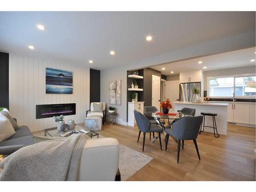 655 84 Avenue Sw, Calgary, AB - Indoor Photo Showing Living Room With Fireplace