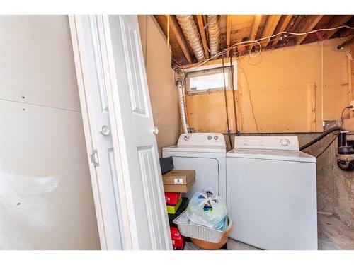 184 Whitaker Close Ne, Calgary, AB - Indoor Photo Showing Laundry Room