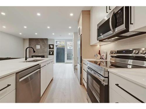 228 20 Avenue Nw, Calgary, AB - Indoor Photo Showing Kitchen With Double Sink With Upgraded Kitchen