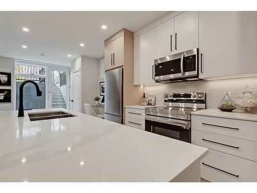 228 20 Avenue Nw, Calgary, AB - Indoor Photo Showing Kitchen With Double Sink With Upgraded Kitchen