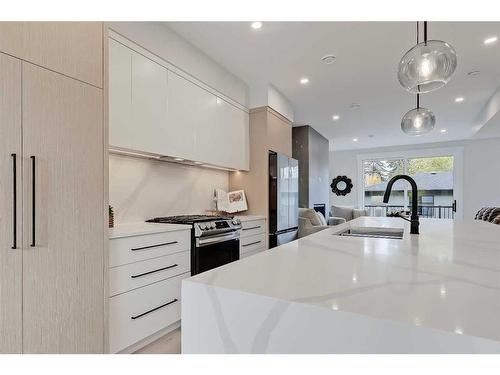 228 20 Avenue Nw, Calgary, AB - Indoor Photo Showing Kitchen With Double Sink With Upgraded Kitchen