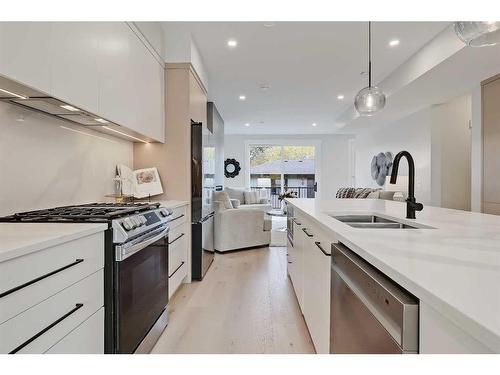 228 20 Avenue Nw, Calgary, AB - Indoor Photo Showing Kitchen With Double Sink With Upgraded Kitchen