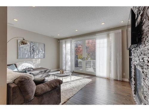 3818 Sarcee Road Sw, Calgary, AB - Indoor Photo Showing Living Room With Fireplace