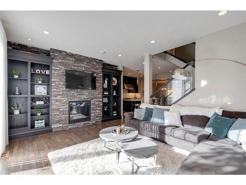 3818 Sarcee Road Sw, Calgary, AB - Indoor Photo Showing Living Room With Fireplace