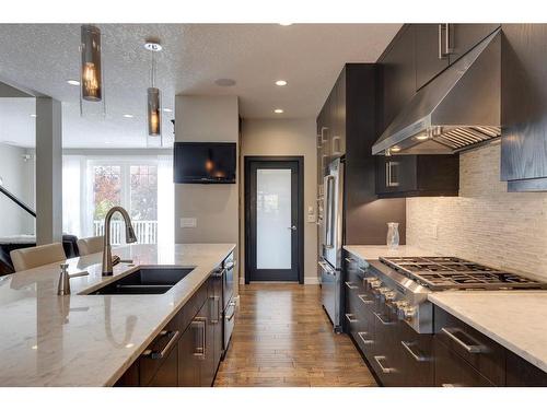 3818 Sarcee Road Sw, Calgary, AB - Indoor Photo Showing Kitchen With Double Sink With Upgraded Kitchen