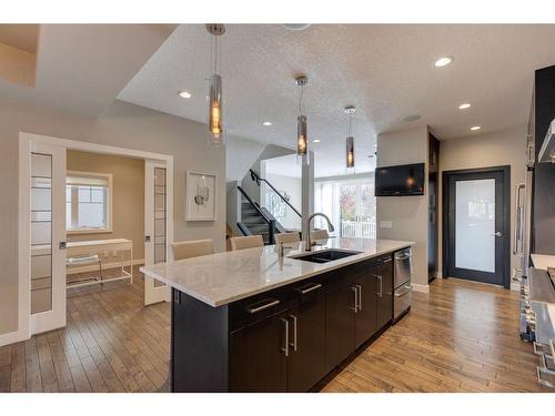 3818 Sarcee Road Sw, Calgary, AB - Indoor Photo Showing Kitchen With Double Sink With Upgraded Kitchen