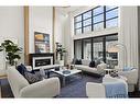 312 Elveden Court Sw, Calgary, AB  - Indoor Photo Showing Living Room With Fireplace 