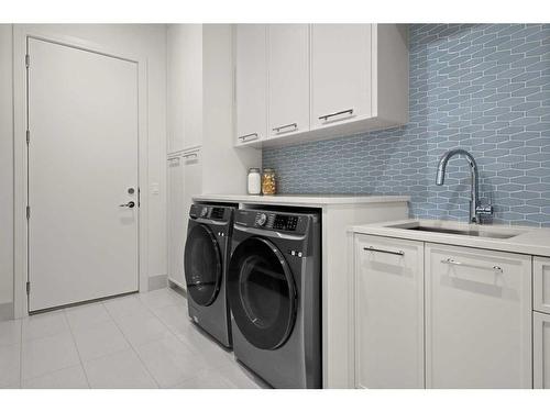 312 Elveden Court Sw, Calgary, AB - Indoor Photo Showing Laundry Room