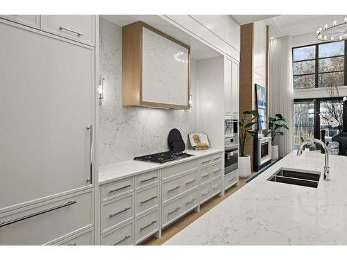 312 Elveden Court Sw, Calgary, AB - Indoor Photo Showing Kitchen With Double Sink