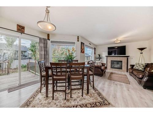 412 Willowbrook Close Nw, Airdrie, AB - Indoor With Fireplace