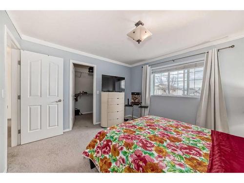 412 Willowbrook Close Nw, Airdrie, AB - Indoor Photo Showing Bedroom