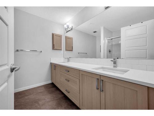 1411-220 Seton Grove Se, Calgary, AB - Indoor Photo Showing Bathroom