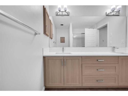 1411-220 Seton Grove Se, Calgary, AB - Indoor Photo Showing Bathroom