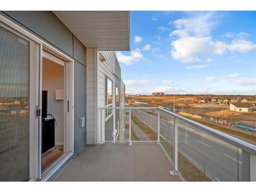 1411-220 Seton Grove Se, Calgary, AB - Outdoor With Balcony With Exterior