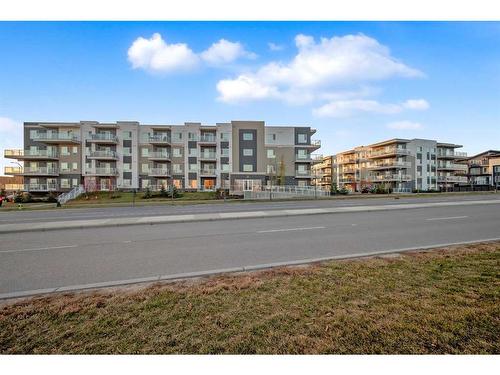 1411-220 Seton Grove Se, Calgary, AB - Outdoor With Balcony With Facade