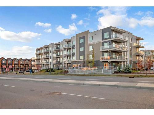 1411-220 Seton Grove Se, Calgary, AB - Outdoor With Balcony With Facade