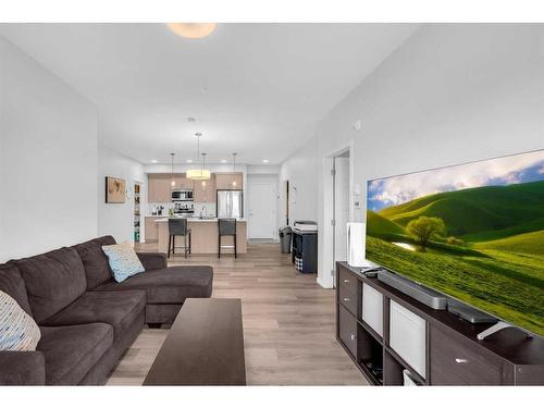 1411-220 Seton Grove Se, Calgary, AB - Indoor Photo Showing Living Room