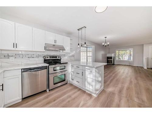 32 Dovista Court Se, Calgary, AB - Indoor Photo Showing Kitchen With Upgraded Kitchen