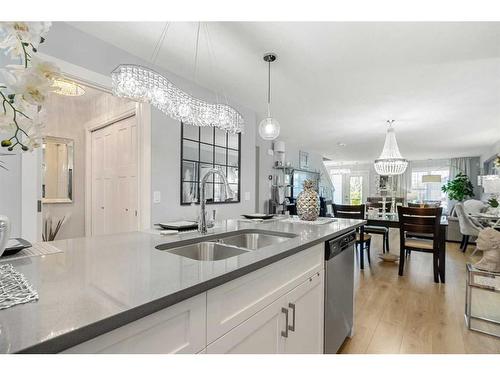 855 Cranston Avenue Se, Calgary, AB - Indoor Photo Showing Kitchen With Double Sink