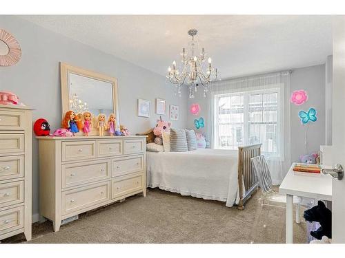 855 Cranston Avenue Se, Calgary, AB - Indoor Photo Showing Bedroom