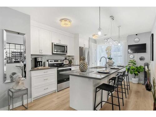 855 Cranston Avenue Se, Calgary, AB - Indoor Photo Showing Kitchen With Stainless Steel Kitchen With Upgraded Kitchen