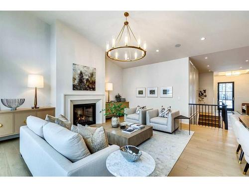 1055 Kerfoot Crescent Sw, Calgary, AB - Indoor Photo Showing Living Room With Fireplace