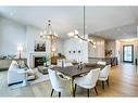 1055 Kerfoot Crescent Sw, Calgary, AB  - Indoor Photo Showing Dining Room With Fireplace 