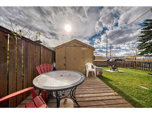 1-524 1 Street East, Cochrane, AB - Outdoor With Deck Patio Veranda