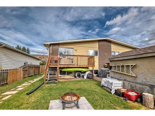 1-524 1 Street East, Cochrane, AB - Outdoor With Deck Patio Veranda With Exterior