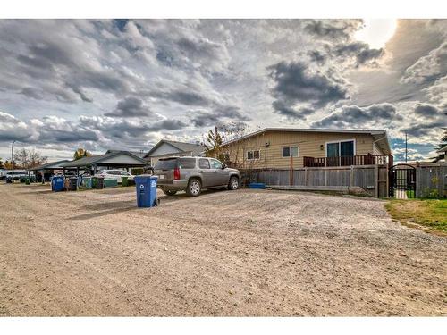 1-524 1 Street East, Cochrane, AB - Outdoor With Deck Patio Veranda