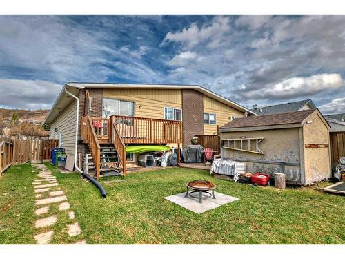 1-524 1 Street East, Cochrane, AB - Outdoor With Deck Patio Veranda