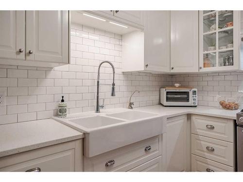 272146 Township Road 274, Rural Rocky View County, AB - Indoor Photo Showing Kitchen With Double Sink