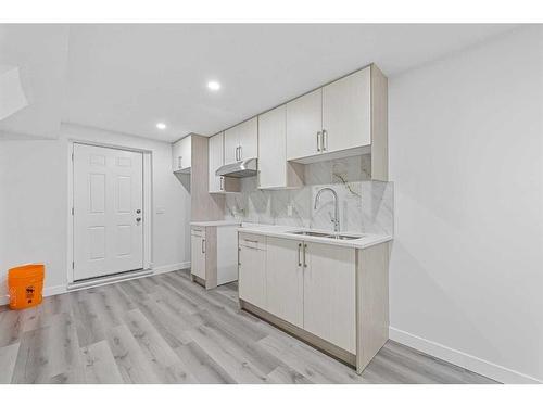 42 Redstone Manor Ne, Calgary, AB - Indoor Photo Showing Kitchen With Double Sink